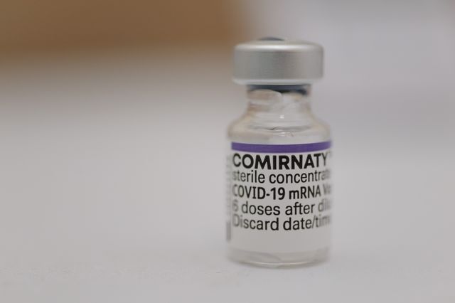 A vial of the Comirnaty (Pfizer) vaccine for COVID-19.
